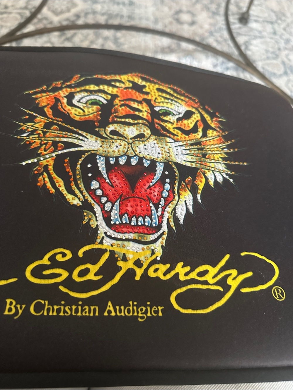 Ed Hardy by Christian Audigier tiger-print padded tablet or laptop sleeve.